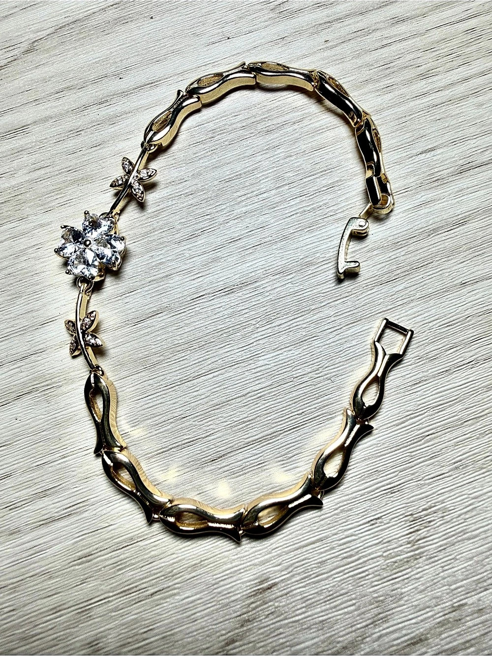 Gold tone Bracelet with Floral Design